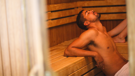 Man Relaxes Deeply In Sauna